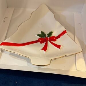 This is a vintage Mount Clemens Pottery Christmas tree-shaped ceramic dish.